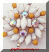 Kramer white orange ab rhinestones brooch