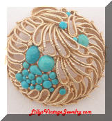 Capri Turquoise gold tone round brooch