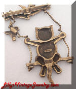 JJ swinging cat bird brooch