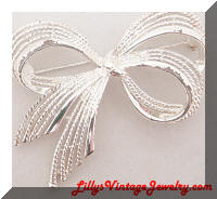 Vintage Napier Silver bow brooch