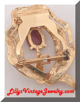 Dress clip brooch gold tone