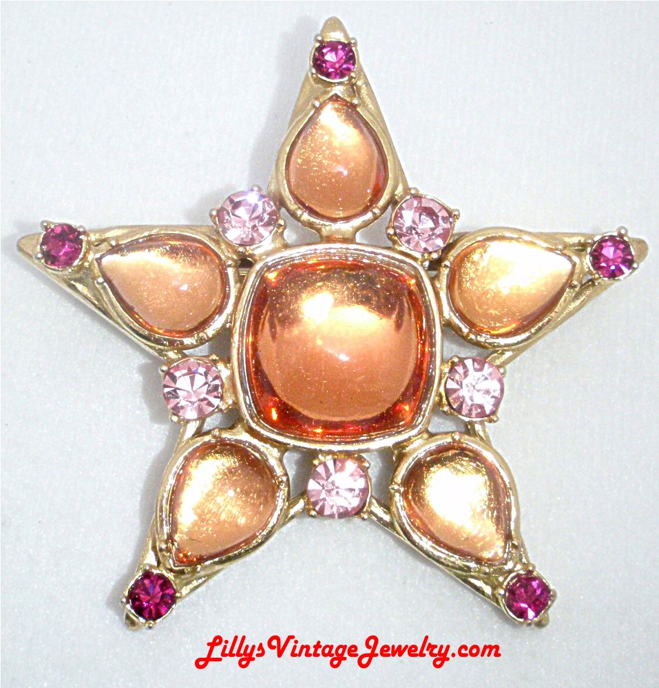 Spectacular YSL Rhinestones Star Brooch   from lillysvintagejewelry.com